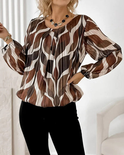 BLUSA CON MANGAS GLOBO Y CUELLO REDONDO
