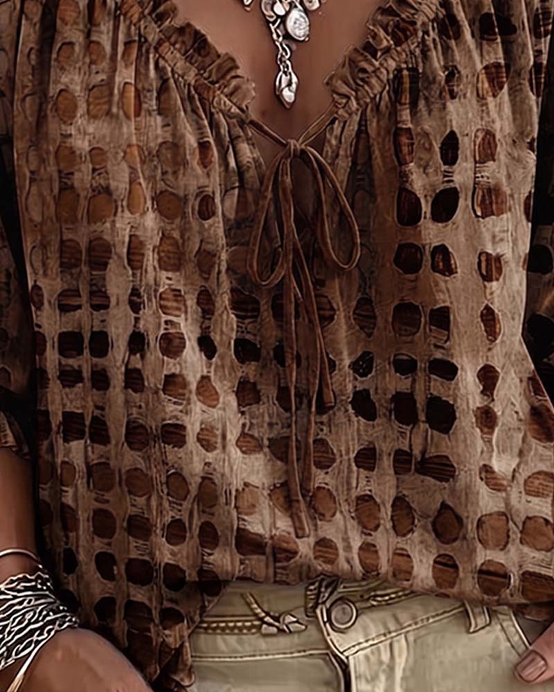 BLUSA DE LUNARES CON CORDONES