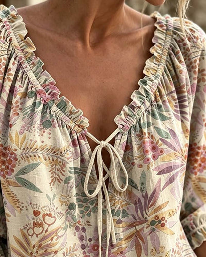 BLUSA CUELLO DE V CON CORDONES