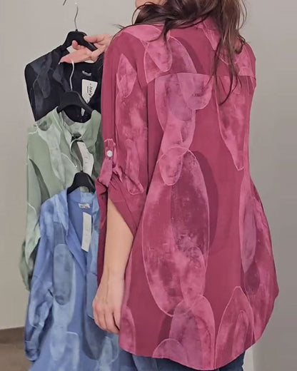 BLUSA ABOTONADA ESTAMPADA BOLSILLO