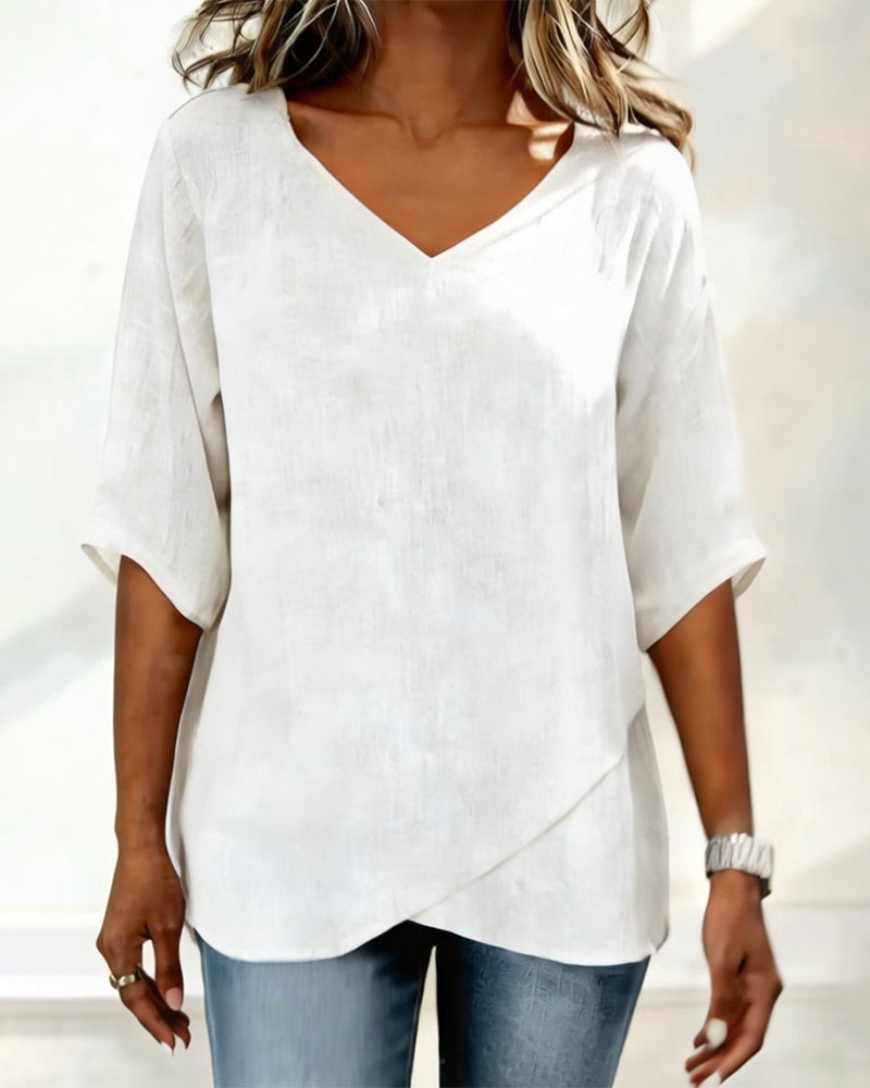 TOP BAJO ASIMÉTRICO LISO CUELLO DE V