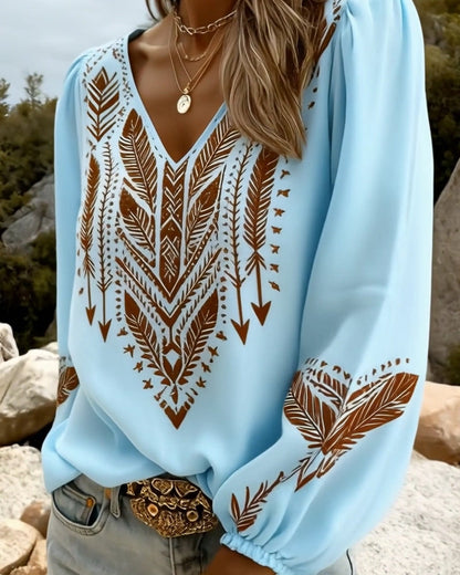 BLUSA MANGA ABULLONADA CUELLO DE V CORTE HOLGADO