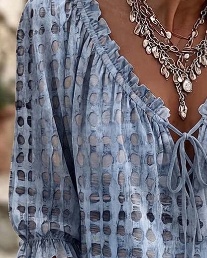 BLUSA DE LUNARES CON CORDONES