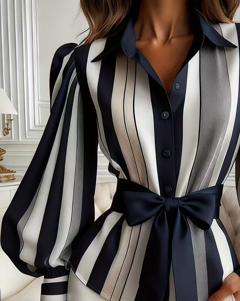 BLUSA CON MANGAS ABULLONADAS A RAYAS CON CUELLO