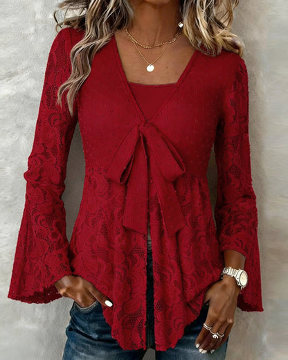 BLUSA LISA CON MANGAS GLOBO Y CUELLO DE V
