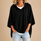 ORIANA | PONCHO DE PUNTO CON CAPUCHA Y MANGA TRES CUARTOS