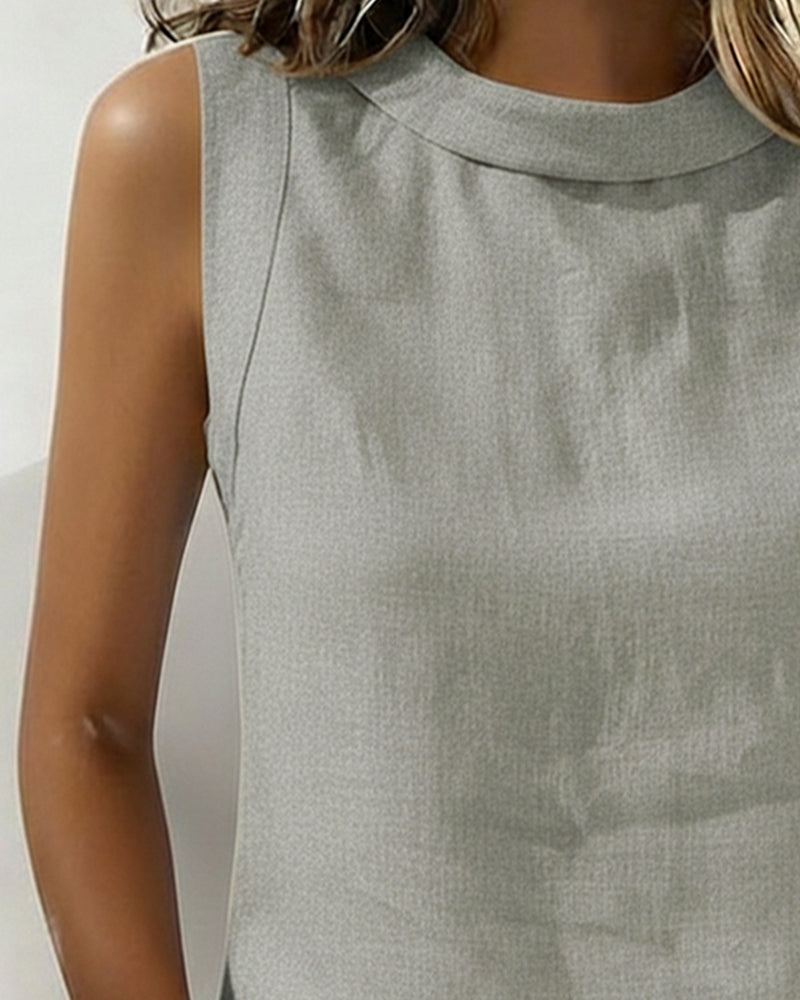 BLUSA SIN CUELLO SIN MANGAS ELEGANTE