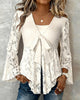 BLUSA LISA CON MANGAS GLOBO Y CUELLO DE V