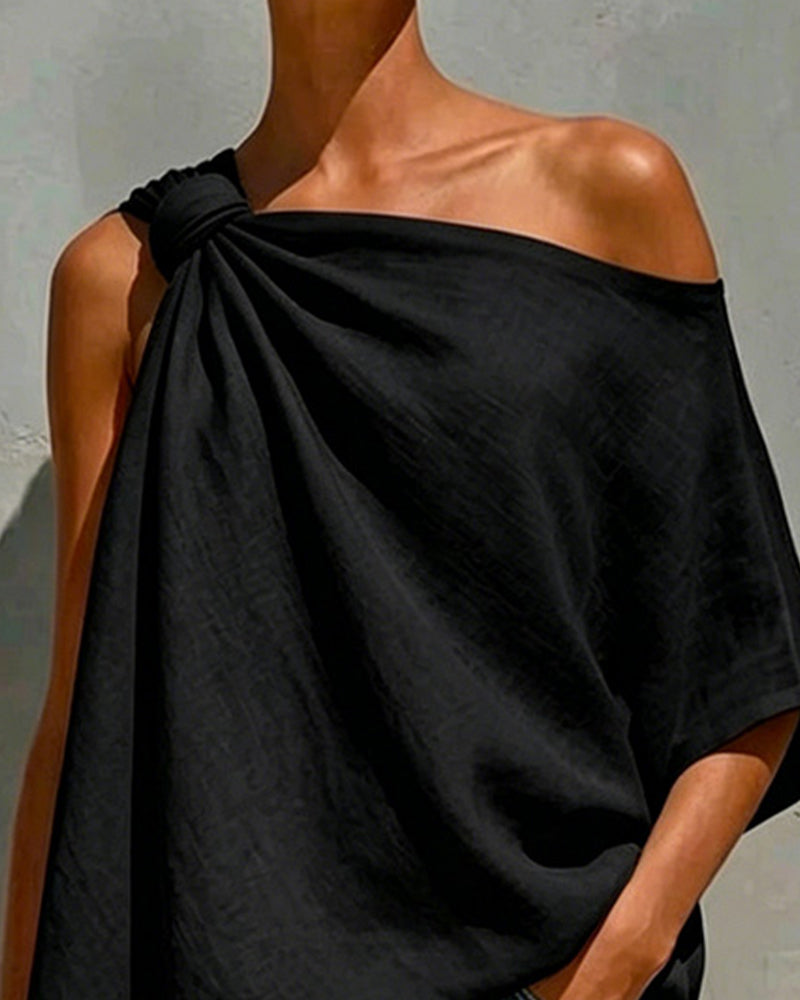 BLUSA UN HOMBRO LAZO ASIMÉTRICO