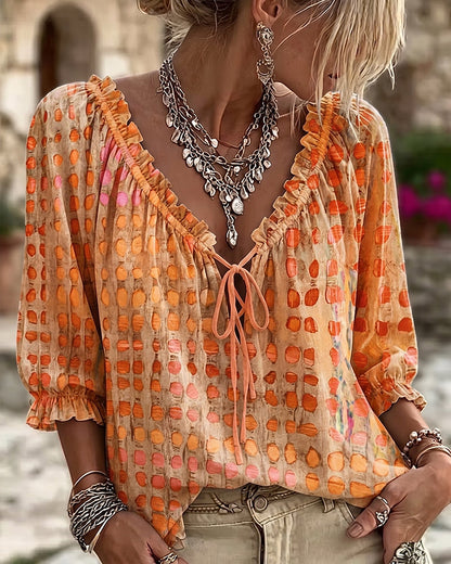 BLUSA DE LUNARES CON CORDONES