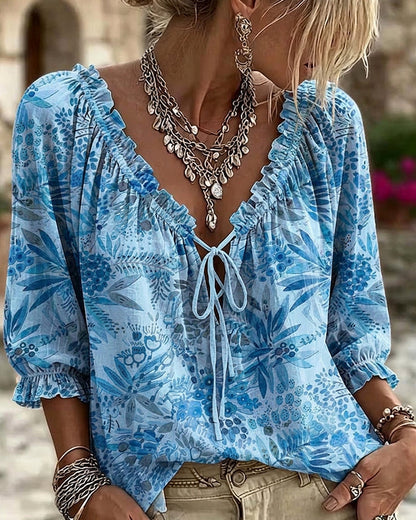 BLUSA CUELLO DE V CON CORDONES