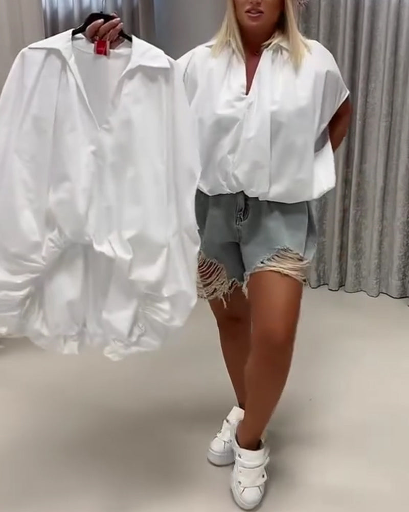 BLUSA CUELLO CORTE HOLGADO MANGA MURCIÉLAGO