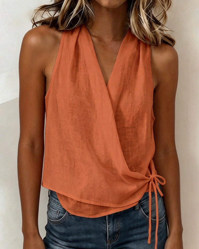 BLUSA LISA SIN MANGAS ESCOTE LAZO CUELLO