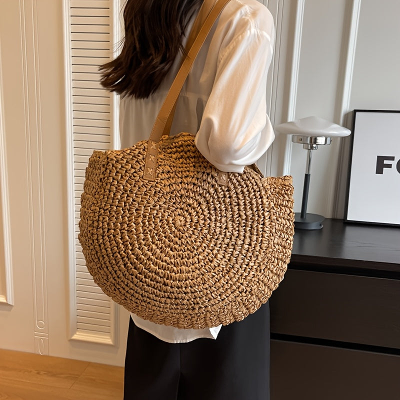 LINDA | BOLSO REDONDO DE PAJA TRENZADA - AVELLANA