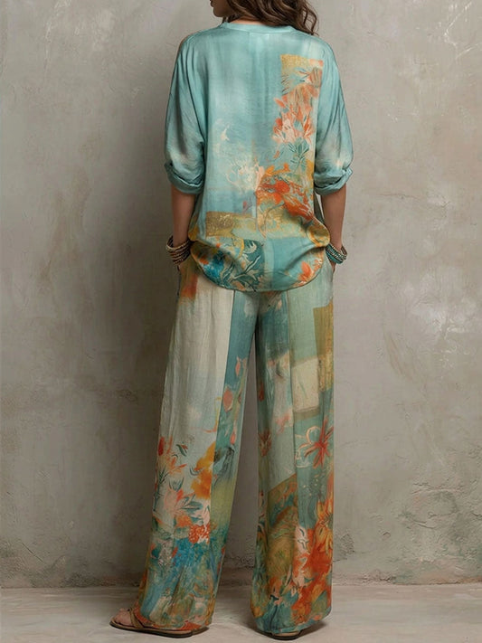 CLARA | CONJUNTO ELEGANTE CON ESTAMPADO FLORAL Y PANTALÓN ANCHO